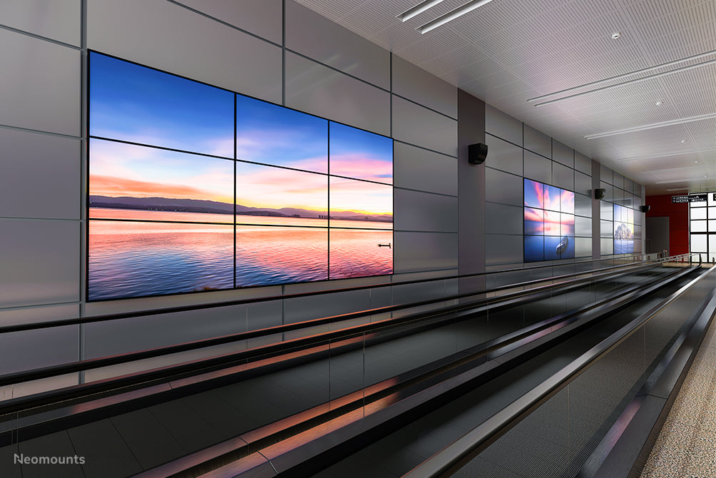 Neomounts LED-VW2500 zwart1 è un supporto a parete piatto per video wall per schermi fino a 75 pollici (191 cm), per montaggio orizzontale e verticale - Nero