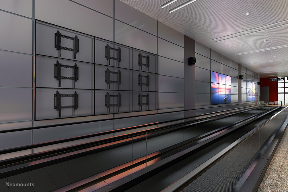 Neomounts LED-VW2500 zwart1 è un supporto a parete piatto per video wall per schermi fino a 75 pollici (191 cm), per montaggio orizzontale e verticale - Nero