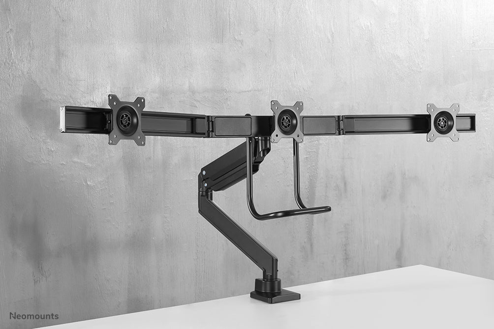 Neomounts NM-D775DX3 nero è un supporto da scrivania con molla a gas, barra trasversale e leva per schermi piatti fino a 27 pollici (68,6 cm).