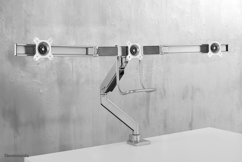 Neomounts NM-D775DX3 argento è un supporto da scrivania con molla a gas, barra trasversale e leva per schermi piatti fino a 27 pollici (68,6 cm).