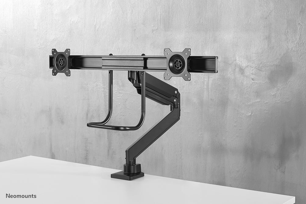 Neomounts NM-D775DX nero è un supporto da scrivania con molla a gas, barra trasversale e leva per schermi piatti fino a 32 pollici (81 cm).