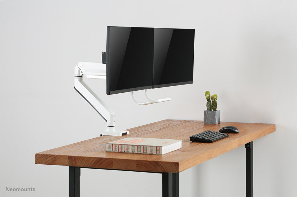 Neomounts NM-D775DX bianco è un supporto da scrivania con molla a gas, barra trasversale e leva per schermi piatti fino a 32 pollici (81 cm).