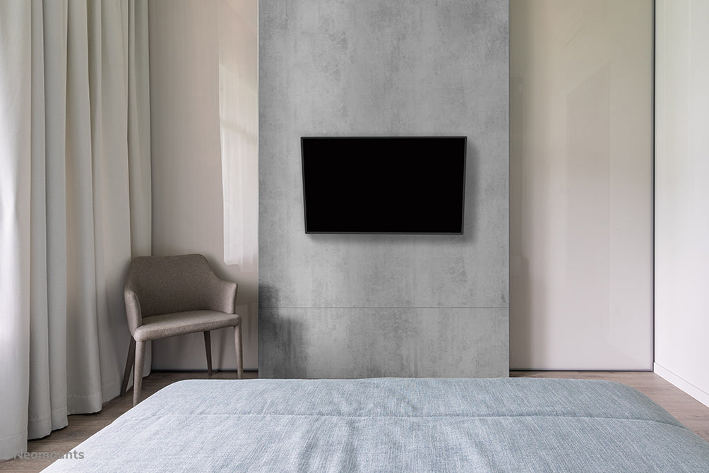 Neomounts WL40-540BL12 full motion wandsteun voor 32-55 inch schermen - Zwart